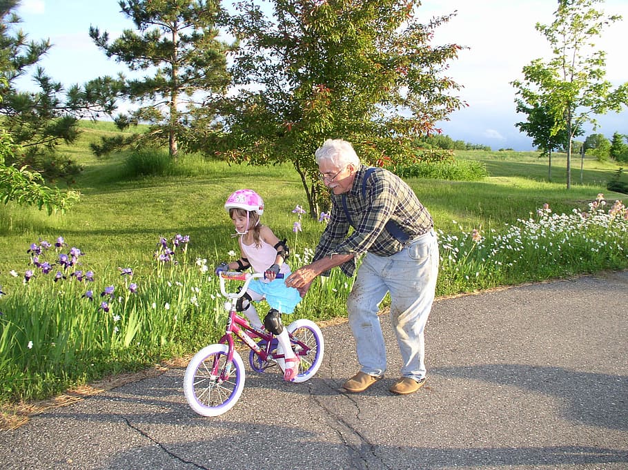 Grandfather helping child